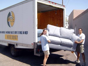 About us - Unloading a furniture donation for a family in need